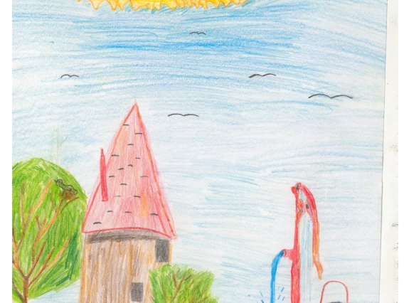 A house is by a river and a water pump flowing with water